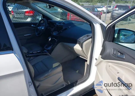 2014 Ford Escape Titanium z USA, uszkodzony, nr VIN 1FMCU9J93EUA35713